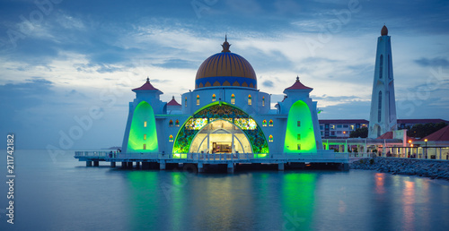 the beautiful Masjid Selat mosque in Melaka city in Malaysia at night photo