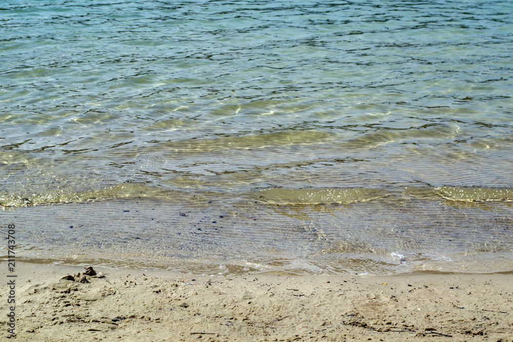 Azure coast. Clean water. Summer beach in sunshine. Azure coast. Clean water. Summer beach in sunshine.