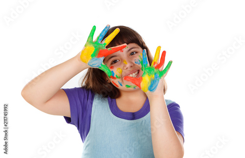 Funny girl with her hands dirty of paint
