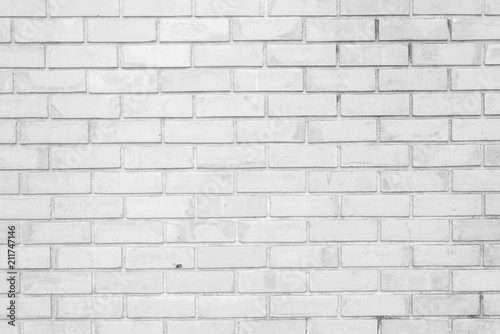 White stone brick wall seamless background and pattern.