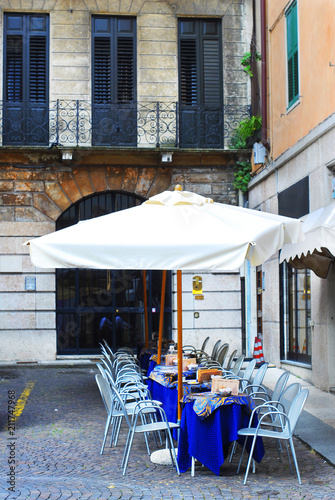  Verona, Italy. The empty tables of cafe in the background