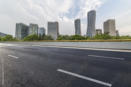 Modern business office buildings with empty road,empty concrete square floor © MyCreative