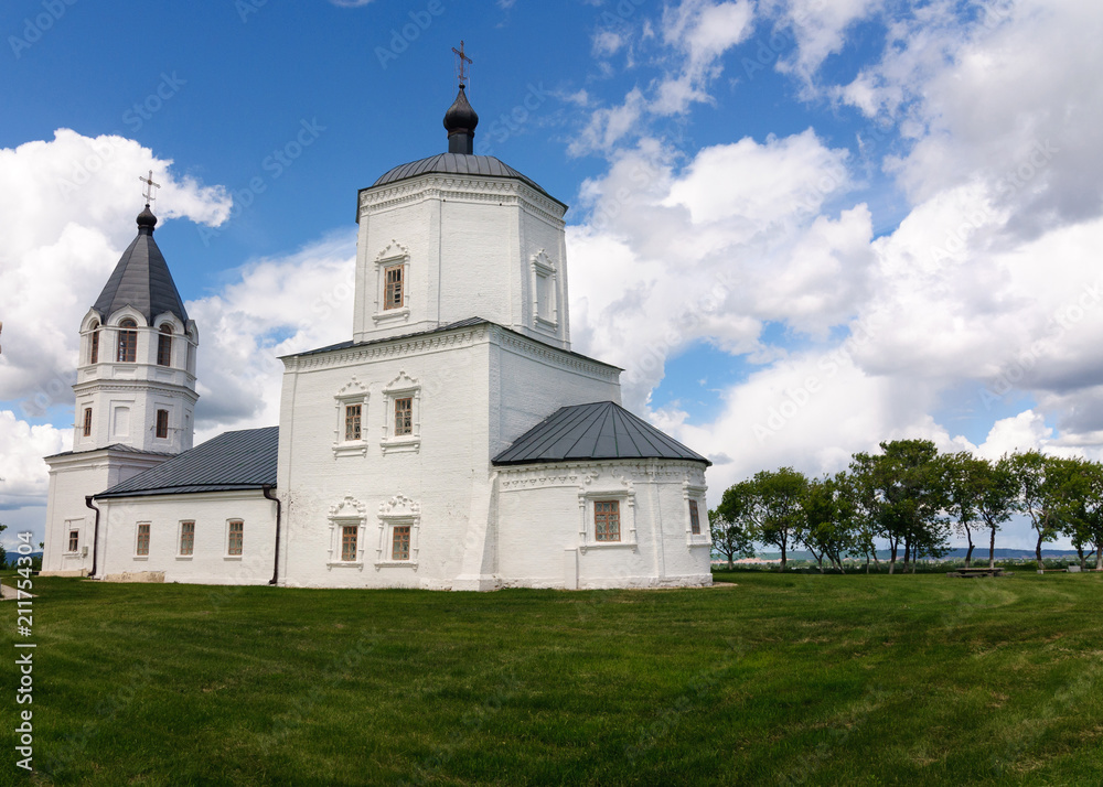 Old white stone Church of the Assumption
