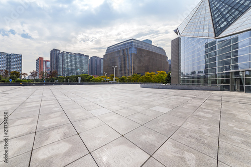 Wallpaper Mural Modern business office buildings with empty road,empty concrete square floor Torontodigital.ca