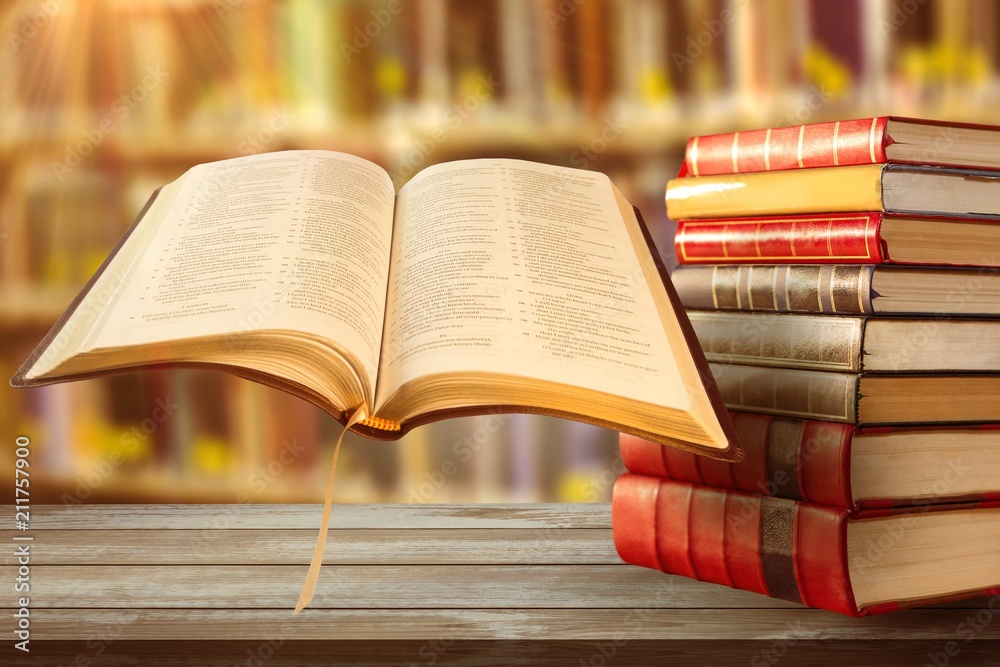 Composite image of close up of open book Composite image of close up of open book