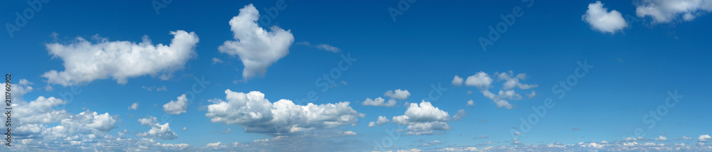 Wide sky panorama with scattered cumulus clouds Wide sky panorama with scattered cumulus clouds