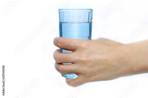  hand close-up on a white background with a glass of water