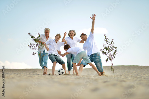 Family playing football