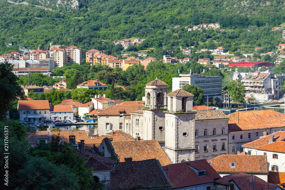 View on the old historical city Kotor with orange tile roofs at the morning, Adriatic sea coastline, Montenegro