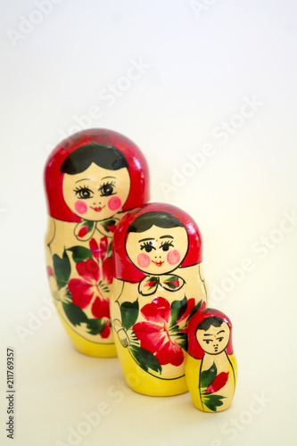 Russian wooden dolls "matryoshka" on a white background © Elena