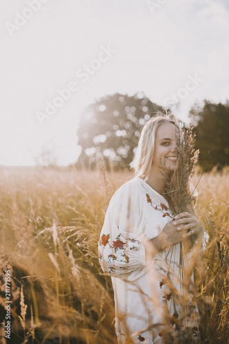 Happy girl in the fields photo