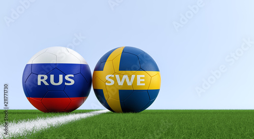 Sweden vs. Russia Soccer Match - Soccer balls in Sweden and Russia national colors on a soccer field. Copy space on the right side - 3D Rendering 