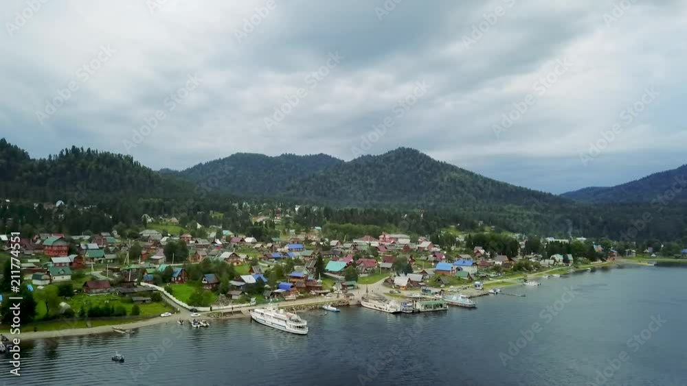 Teletskoye lake and Altai mountains. Northern shore. Altai Republic Siberia. Russia. Dron footage. Teletskoye lake and Altai mountains. Northern shore. Altai Republic Siberia. Russia. Dron footage.