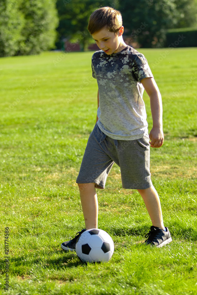 Pre-teen caucasian boy playing outside Pre-teen caucasian boy playing outside