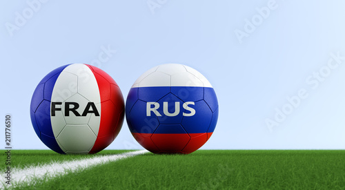 Russia vs. France Soccer Match - Soccer balls in France and Russia national colors on a soccer field. Copy space on the right side - 3D Rendering 