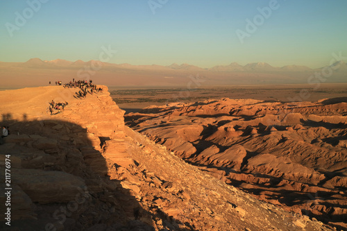 Many people waiting for the beautiful sunset at the Moon Valley in Atacama Desert, San Pedro Atacama, Northern Chile 