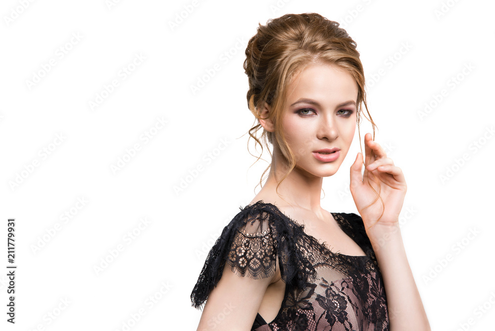 Portrait of a beautiful fashion model in black lace dress isolated on white background Portrait of a beautiful fashion model in black lace dress isolated on white background