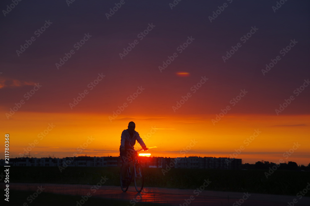 Biker man on sunset