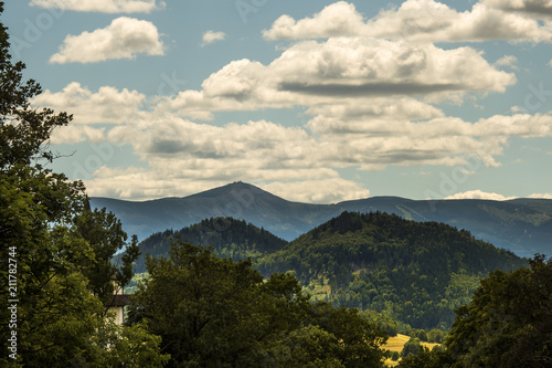 Mountain landscape, Karkonosze Mountains with clouds in the background. © Kozioł Kamila