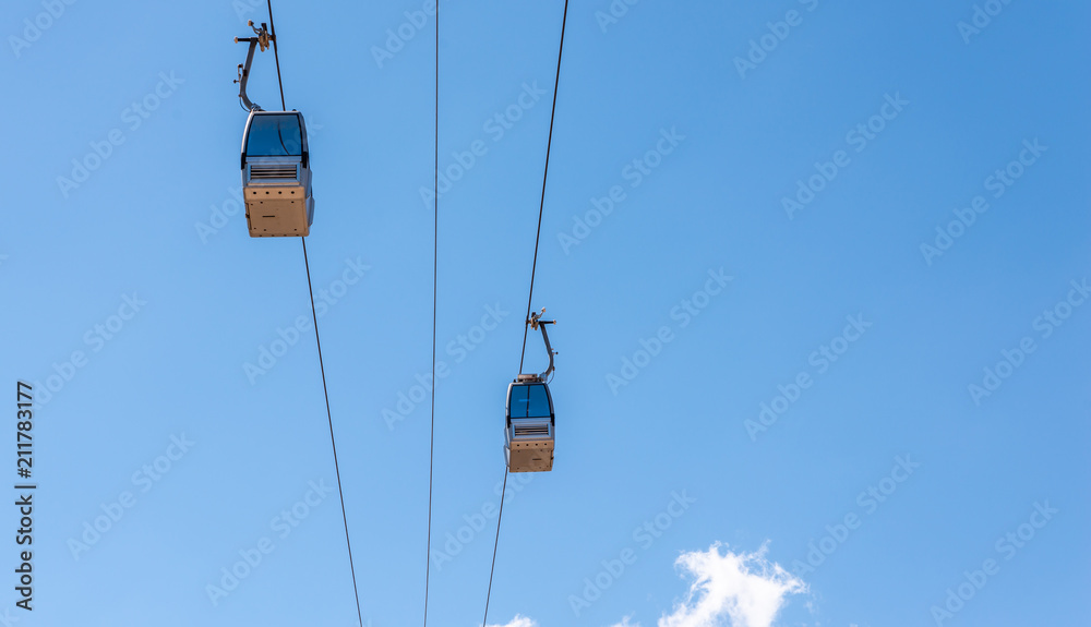 cableway against the sky, transport at height and tourist attraction cableway against the sky, transport at height and tourist attraction
