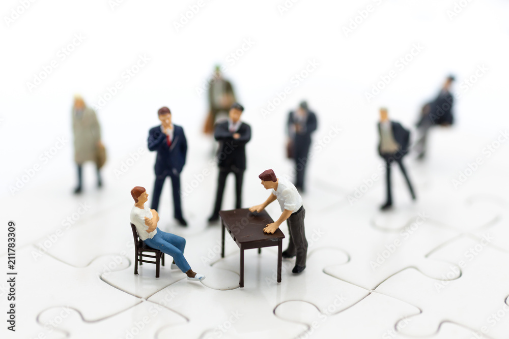 Miniature people : Businessman group consult business ideas. Image use for to solve problems, business concept. Miniature people : Businessman group consult business ideas. Image use for to solve problems, business concept.