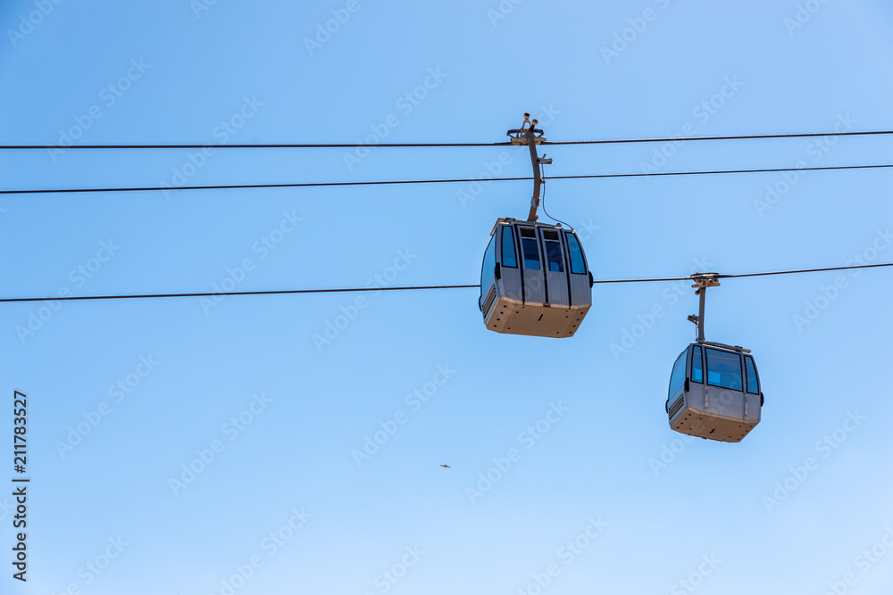 cableway against the sky, transport at height and tourist attraction cableway against the sky, transport at height and tourist attraction