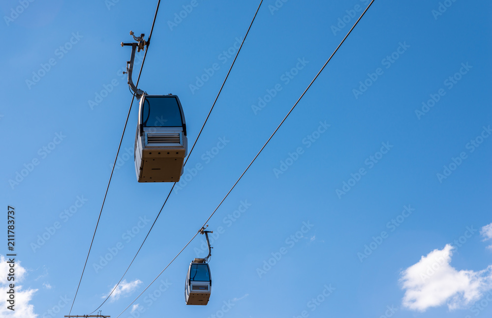 cableway against the sky, transport at height and tourist attraction cableway against the sky, transport at height and tourist attraction