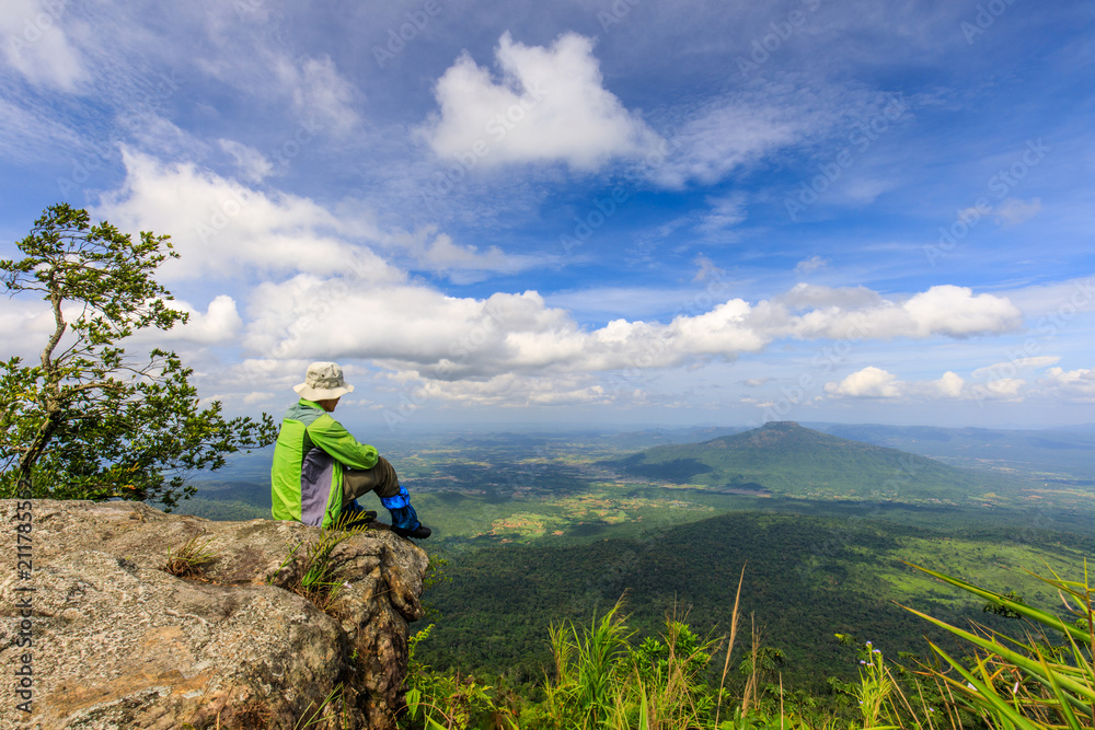 The hiking man touring on  high mountain in Loei province, Thailand.