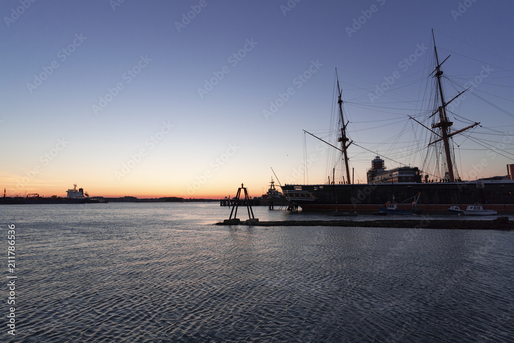 Sunset at Portsmouth Harbour with HMS Victory (warship)