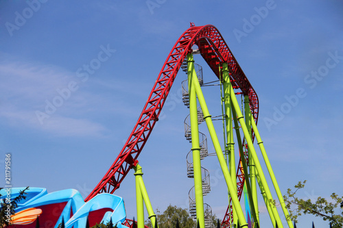 High roller coaster for a ride on blue sky © Николай Григорьев