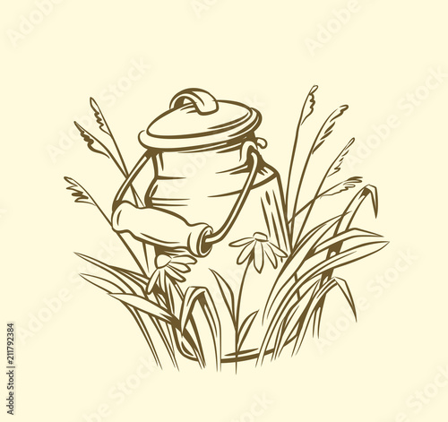 Milk cans with grass