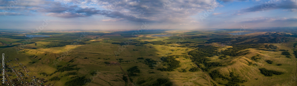 Panoramic view from drone of the fields near mountains Panoramic view from drone of the fields near mountains