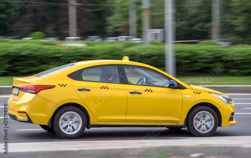 yellow taxi cab speeding © VladFotoMag