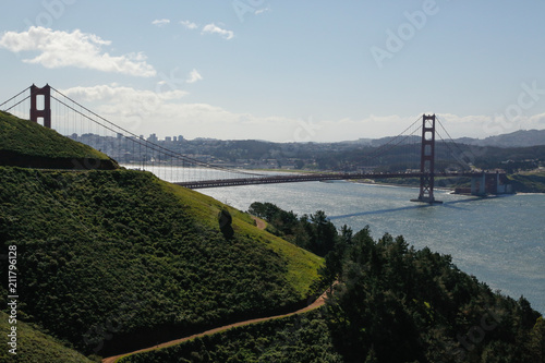 Green hill against Golden Gate Bridge, USA