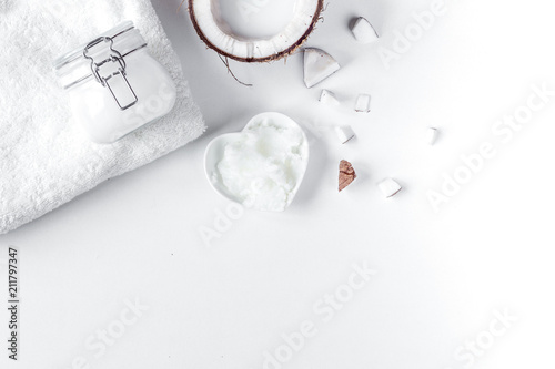 organic cosmetics with coconut on white background top view mock