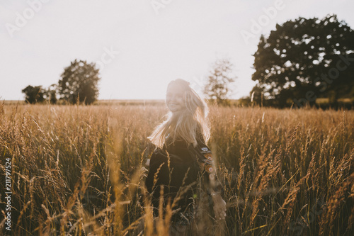 Happy girl in the fields photo