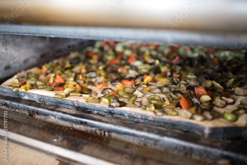 generic photos of Italian pizza preparation