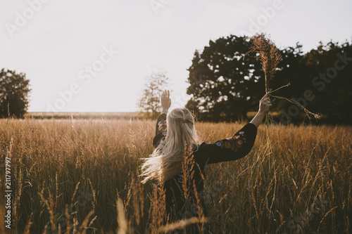 Happy girl in the fields photo