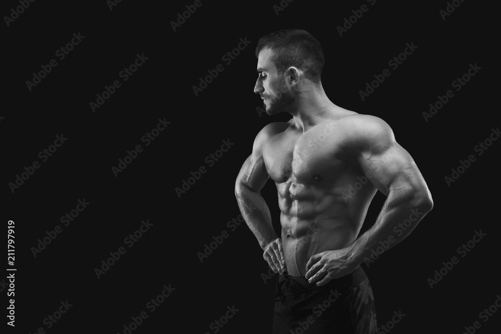 Fototapeta premium Strong athletic man showes naked muscular body