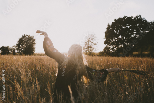 Happy girl in the fields photo