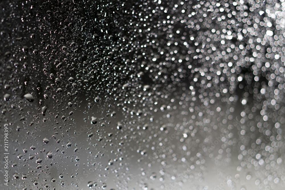 Fototapeta premium water drop on glass when raining for bakcground.
