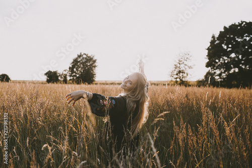 Happy girl in the fields photo