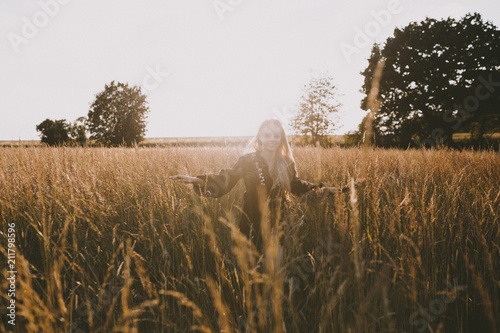 Happy girl in the fields photo