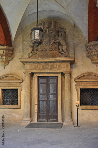 Italy  Bologna old medieval building door in Accursio palace interior. 