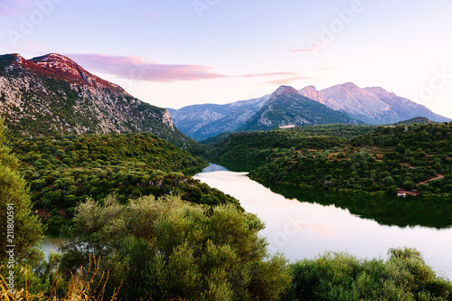 River Cedrino landscape view with mountains on the sunset © knazarenko