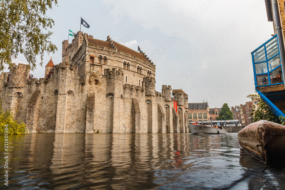 Fototapeta premium moat with water in front of the castle, Ghent Belgium