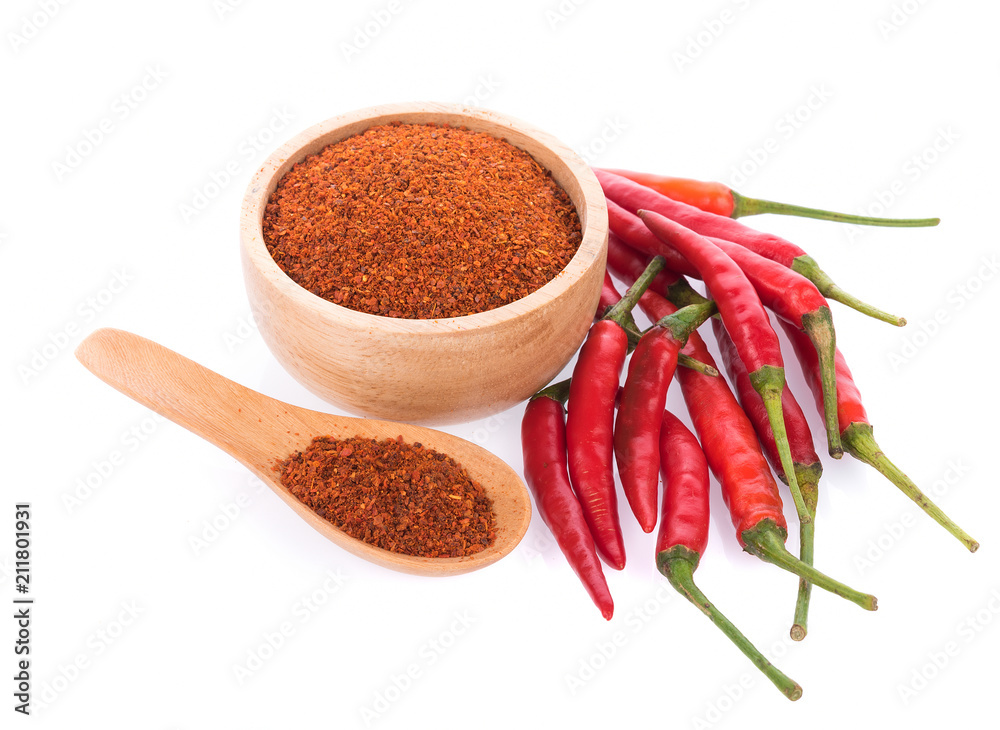Pile of red paprika powder on spoon wooden Pile of red paprika powder on spoon wooden