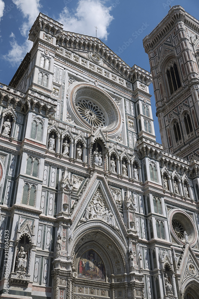 Fototapeta premium Firenze, Italy - June 21, 2018 : View of Florence Cathedral (Cattedrale di Santa Maria del Fiore) and Giotto bell tower