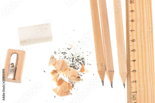 Pencil ruler sharpener and eraser isolated over white background