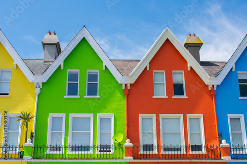 colorful houses yellow, green, red and blue in row in Whitehead Northern Ireland  